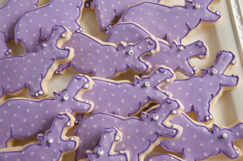 Hippo decorated sugar cookie with purple polka dots