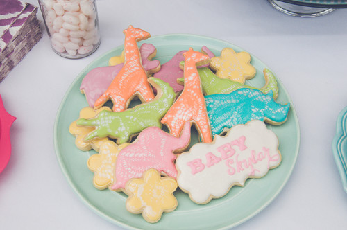 Shimmery lace effect airbrushed onto alligator, giraffe, rhino, elephant and hippo cookies